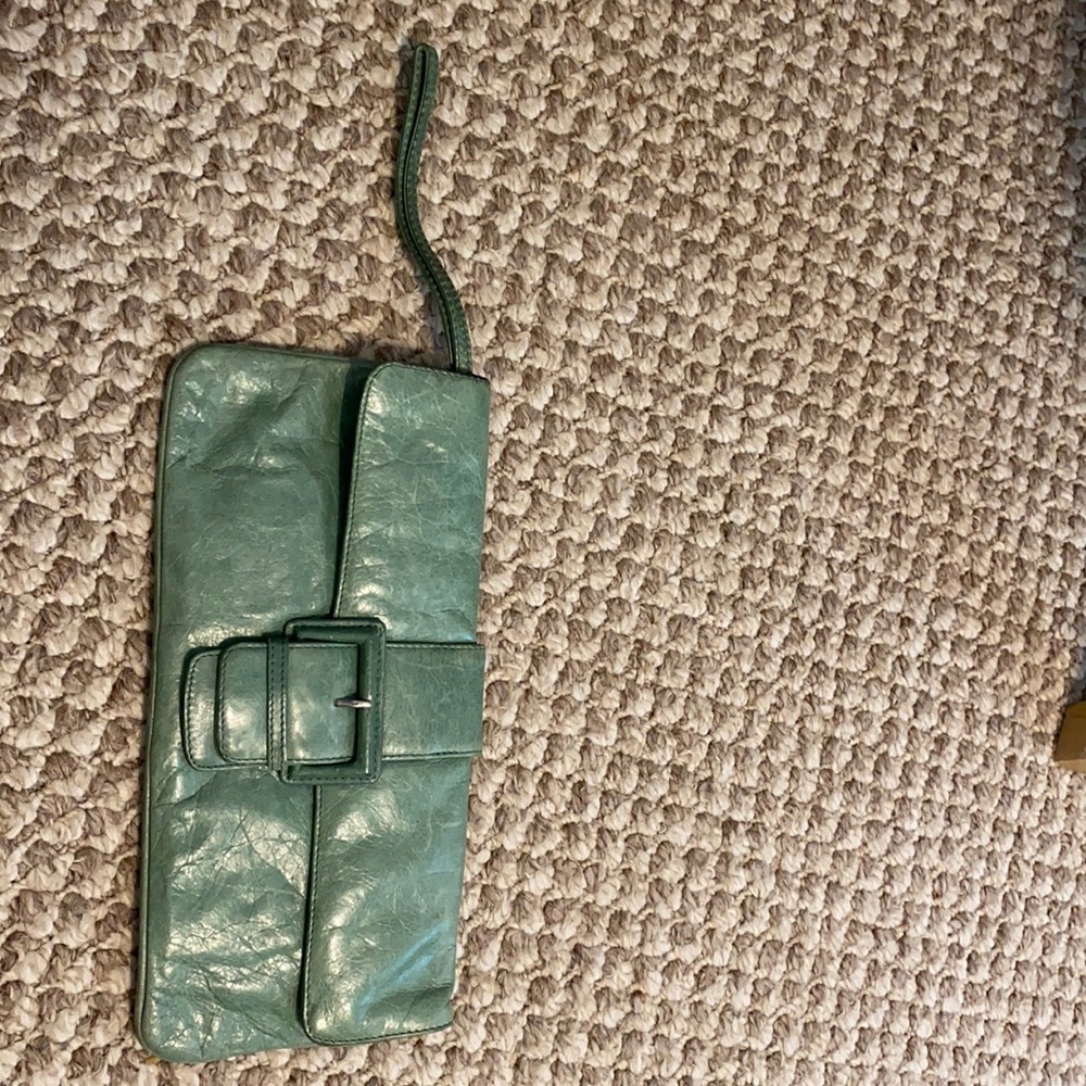 Leather light green clutch